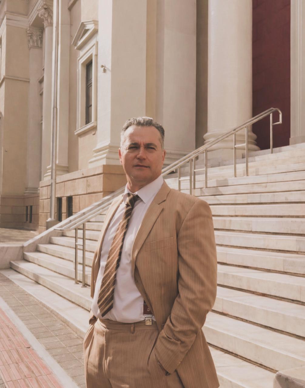 zindros Nikolaos S. Zindros on the steps of a courthouse